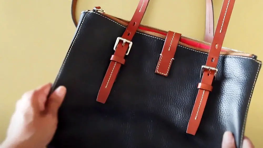 How do you clean a dooney and bourke purse