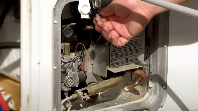 How to clean rv water heater tank