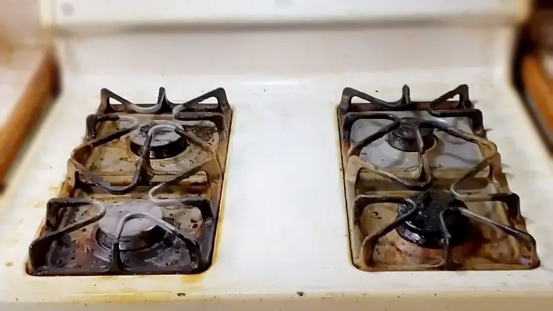 How to remove burnt milk from stove
